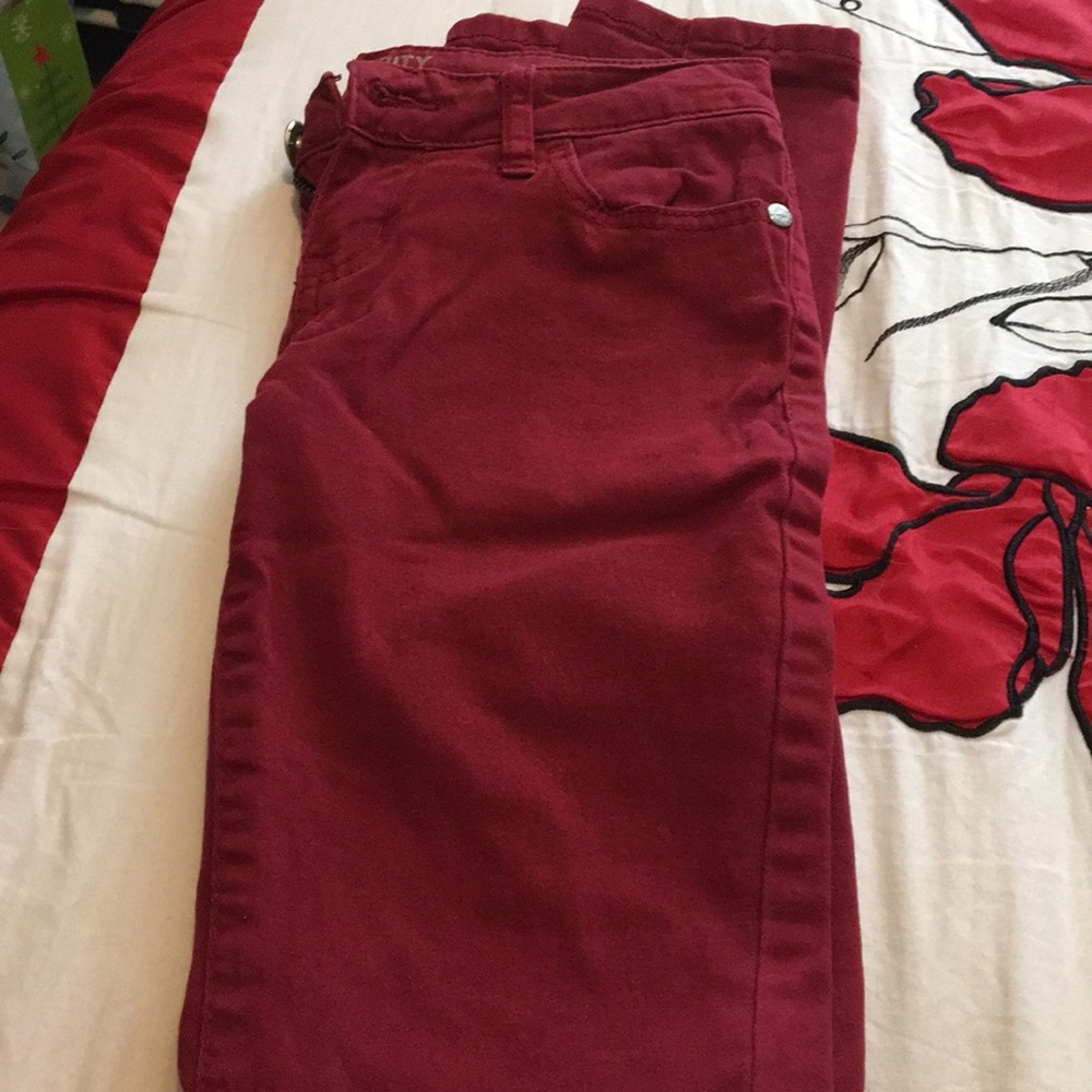 Red skinny jeans.